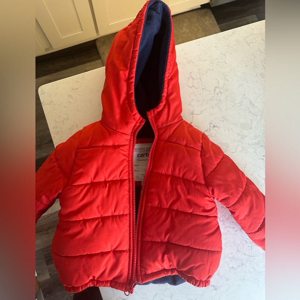 Red toddler Carter’s jacket